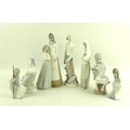 A group of Lladro bisque figurines, comprising a figurine modelled as Don Quixote, model no. 4854, 3... 
