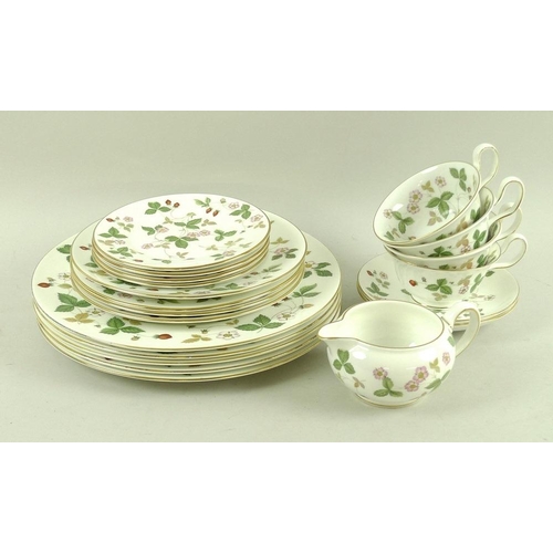 537 - A Wedgwood part tea set, 'Wild Strawberry' pattern, R 4406, comprising four cups, 13 by 5.5cm, two s... 