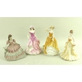 A group of figurines comprising Royal Doulton figurines 'Patricia', number HN4738 in yellow and whit... 