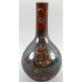 A Satsuma bottle vase, charcoal grey body decorated with love birds in a tree and iron red enamel bo... 