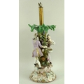A large 19th century Meissen centre piece later converted to a lamp, formed as a courting couple cha... 