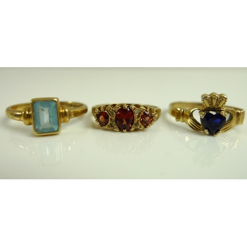 892 - A 9ct gold claddagh ring set with a heart shaped sapphire, size P, 1.5g, together with a 9ct gold ri... 