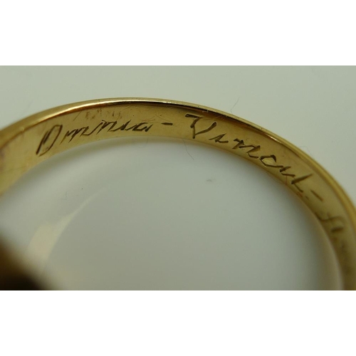 894 - A collection of bijouterie and medals, including an 18ct gold ring, the band engraved Omnia vincet a... 