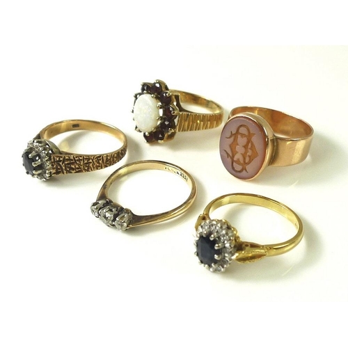 898 - A group of five 9ct gold dress rings, comprising an opal and garnet cluster ring, central opal 9 by ... 