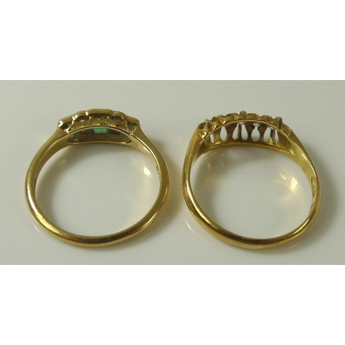 902 - Two 18ct gold Edwardian rings, comprising an 18ct gold, emerald and diamond ring, marked 1916, size ... 