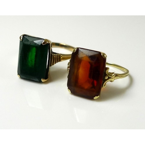 911 - A 9ct gold ring set with a green abraded glass, emerald cut, size N/0, together with a gold and ambe... 