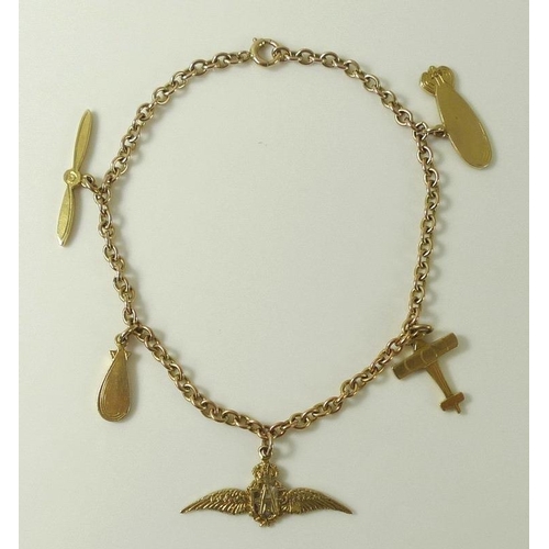 912 - A 9ct gold RAF sweetheart charm bracelet with five 9ct gold charms, including wings, plane and prope... 