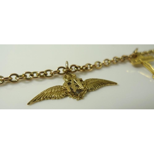 912 - A 9ct gold RAF sweetheart charm bracelet with five 9ct gold charms, including wings, plane and prope... 