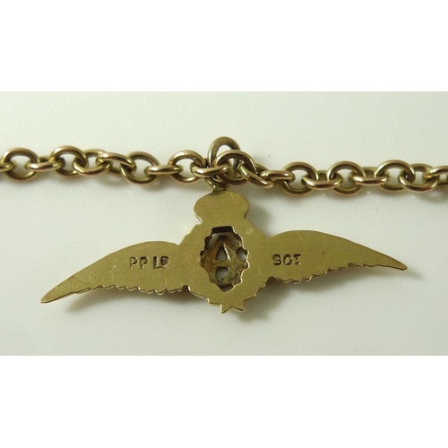 912 - A 9ct gold RAF sweetheart charm bracelet with five 9ct gold charms, including wings, plane and prope... 