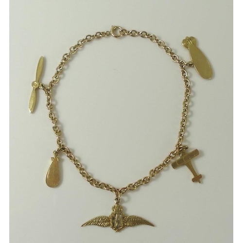 912 - A 9ct gold RAF sweetheart charm bracelet with five 9ct gold charms, including wings, plane and prope... 