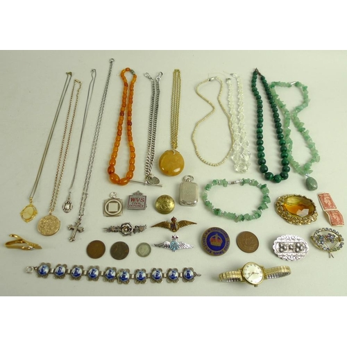 914 - A collection of costume jewellery including a 9ct gold chain with circular rolled gold locket, two V... 