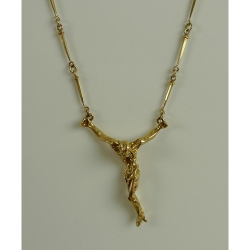 916 - After Salvador Dali: an 18ct gold crucifix necklace after the painting 'The Christ of Saint John of ... 