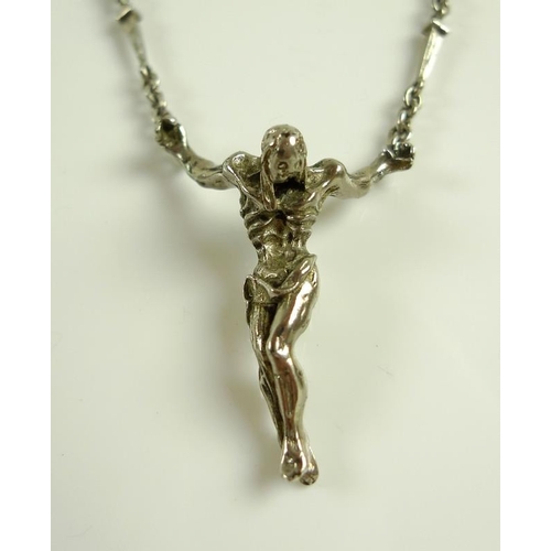 923 - After Salvador Dali: a limited edition silver crucifix necklace with detachable bracelet after the p... 