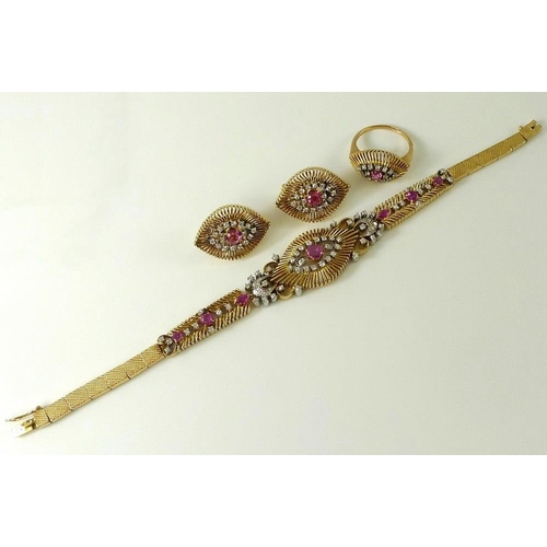 938 - A 14ct gold, diamond and ruby suite of jewellery, circa 1970s, comprising a bracelet, earrings and r... 