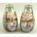 A pair of Royal Doulton vases painted by Harry Allen, of lobed form, each decorated with a mother an... 