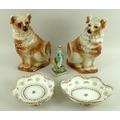 A group of English ceramics, 19th century and later, comprising a pair of Staffordshire fireside dog... 