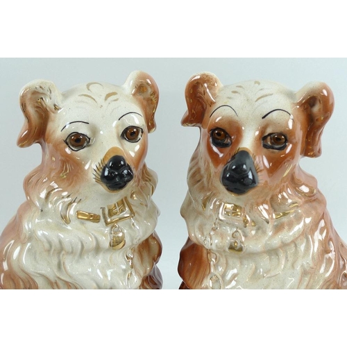 512 - A group of English ceramics, 19th century and later, comprising a pair of Staffordshire fireside dog... 