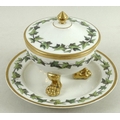 A KPM Berlin porcelain tureen, cover and stand, both painted with bands of trailing ivy, gilt rims, ... 