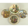 A collection of four 19th century pot lids, one depicting The Fish Barrow, lace border, 13cm, one de... 