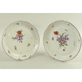 A pair of late 18th century Ludwigsburg porcelain plates, the rims with basket weave moulding and pa... 