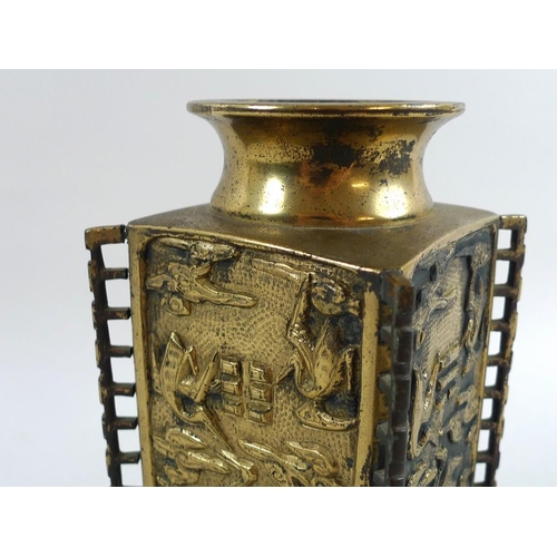 762 - A Chinese bronze vase, Qing Dynasty, late 19th century, of cong form with slab sides, applied and pi... 