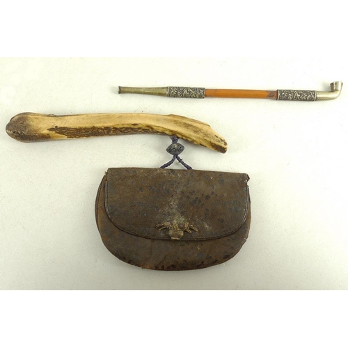 766 - A Japanese kiseru (pipe) and tobacco pouch, Meiji period, late 19th century, the pipe with white met... 