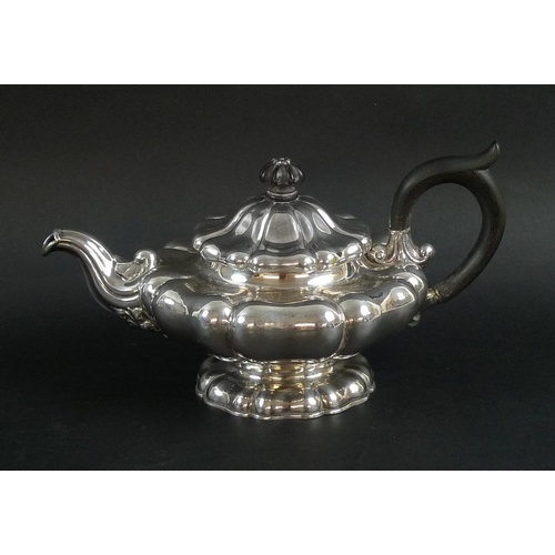 776 - A late 19th / early 20th century silver teapot styled as a Tudor Rose, the sinuous spout with chased... 