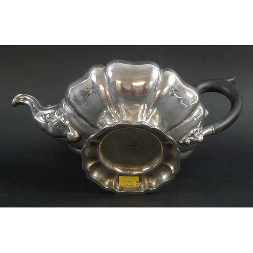 776 - A late 19th / early 20th century silver teapot styled as a Tudor Rose, the sinuous spout with chased... 