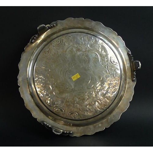 781 - An Old Sheffield Plate armorial dish raised on three feet, cast applied rim, engraved crest with the... 