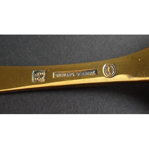 783 - A modern Georg Jensen silver gilt spoon, dated 1980, designed by Rigmor Andersen & Annelise Bjorner,... 