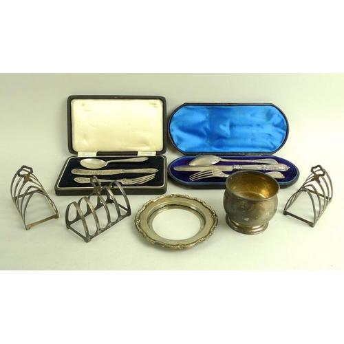 784 - A group of Victorian and later silver items, comprising three matching George V silver toast racks, ... 