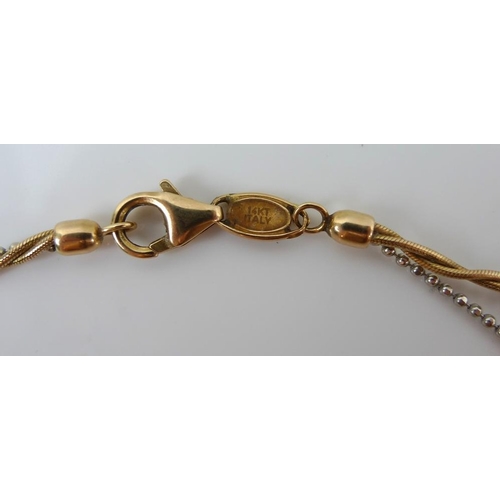 790 - An unusual 14ct gold multi-strand twisted chain, lozenge next to clasp marked Amoro 14kt Italy, 46cm... 