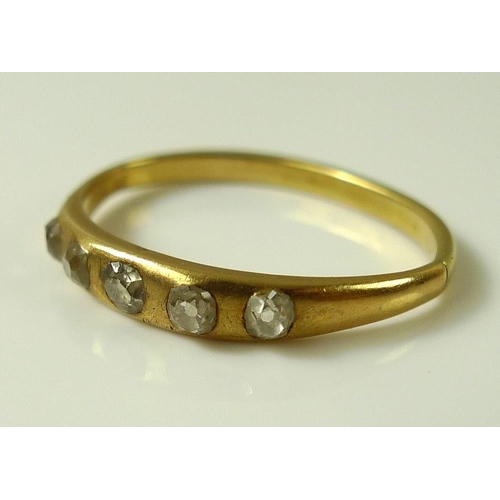 797 - A 14ct gold ring set with five old cut diamonds, approx 0.2ct total diamond weight, band mis-shapen,... 