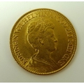 A gold 10 Guilders Netherlands Wilhelmina coin, 1917, 900 fineness, 6.7g.
