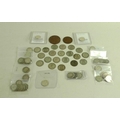 A collection of silver coins, including two uncirculated 1901 silver threepences, an 1854 Victoria y... 