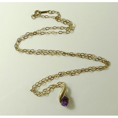 812 - A 9ct and amethyst necklace, of cross over design  with central pear cut amethyst crowned with a dia... 