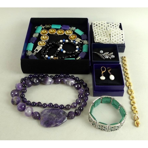 816 - A large quantity of costume jewellery including hat pins, a lilac quartz necklace, a Pia silver bead... 