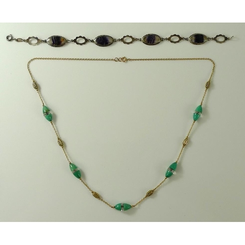 837 - A 9ct gold and green stone necklace, possibly malachite each oval bead intersected by a cut glass ri... 