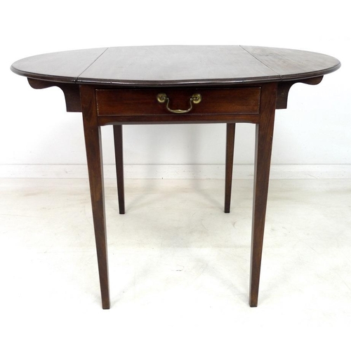 927 - A Regency mahogany Pembroke table, the oval surface with drop leaves, single drawer with brass swan ... 