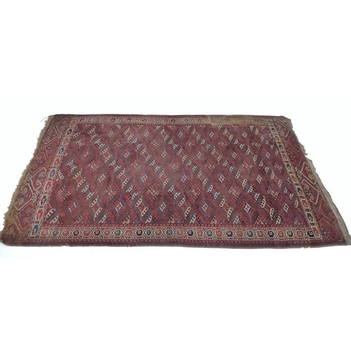 930 - A finely knotted Persian Tekke rug, early 20th century, with red ground, repeating diamond guls with... 