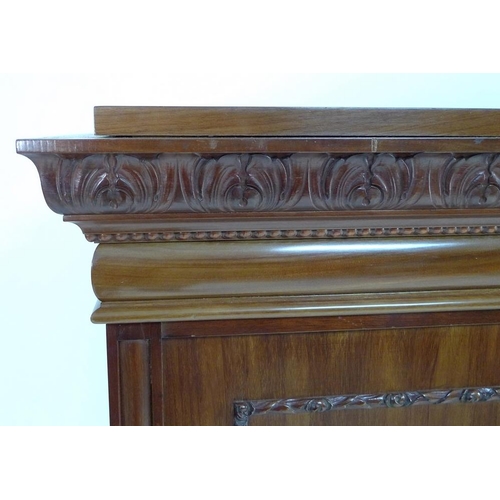 931 - A good Edwardian mahogany bookcase, outswept cornice with foliate carved decoration, beading and cus... 