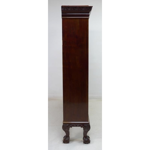 931 - A good Edwardian mahogany bookcase, outswept cornice with foliate carved decoration, beading and cus... 