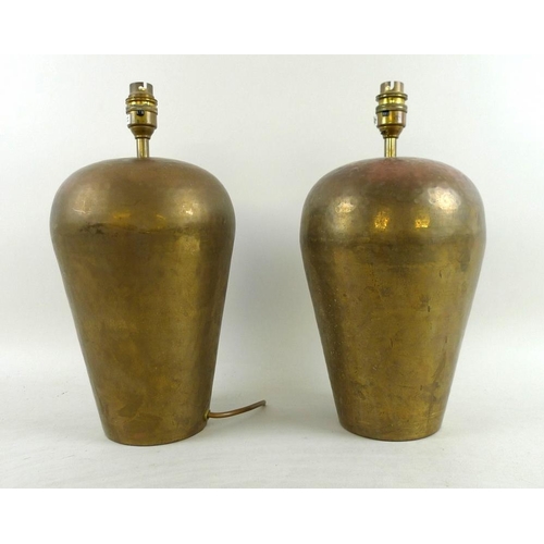 939 - A pair of beaten copper table lamps, late 20th century, of tapering ovoid form, with a matt patina a... 