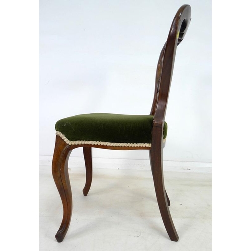 942 - A set of six Victorian rosewood dining chairs, with carved rails and moulded frames, upholstered in ... 