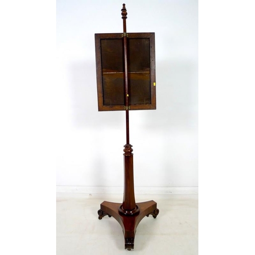 944A - A William IV rosewood pole screen, with tri-partite mahogany base, the later tapestry depicting a Fr... 