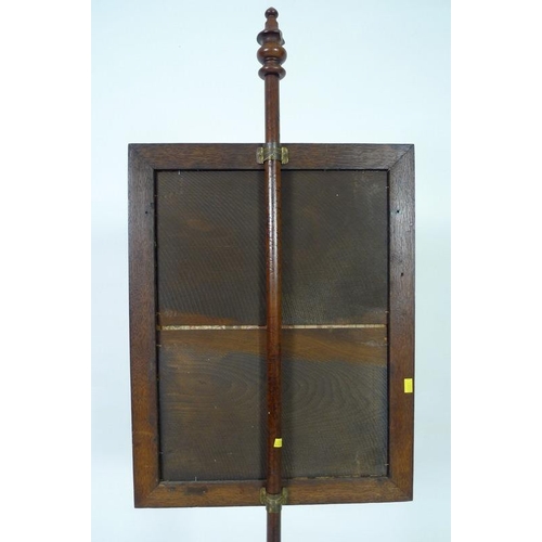 944A - A William IV rosewood pole screen, with tri-partite mahogany base, the later tapestry depicting a Fr... 