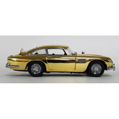 303 - A 1/24 scale 22 carat gold plated die cast and ABS plastic replica model Aston Martin DB5, by Danbur... 