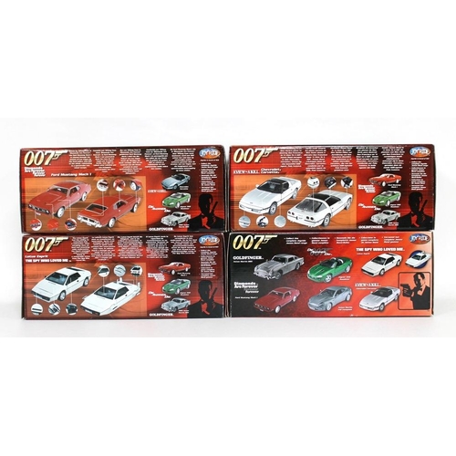 306 - A group of four 1/18 scale die cast replica models, all boxed, by Joyride, RC2 Brands Inc, comprisin... 