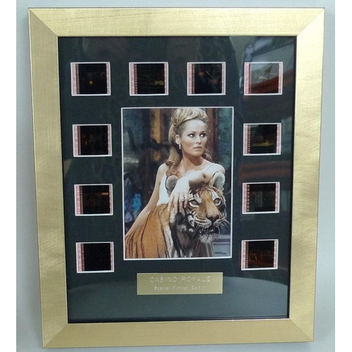 320 - A group of twelve framed collections of 35mm film cells and miniature movie posters, comprising 'Cas... 