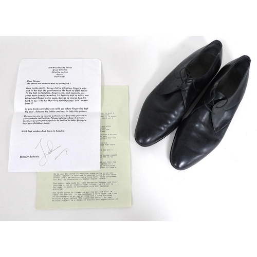 325 - A pair of black leather shoes worn by Roger Moore, retailed by Simpson of Piccadilly by Bally of Swi... 